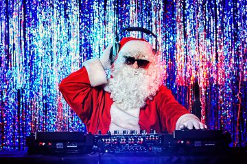 bigstock-DJ-Santa-Claus-mixing-up-some-39865849