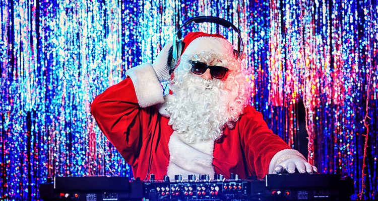 bigstock-DJ-Santa-Claus-mixing-up-some-39865849